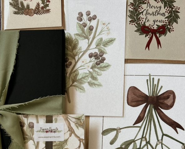 flat lay of products packing order for christmas Pippin Prints
