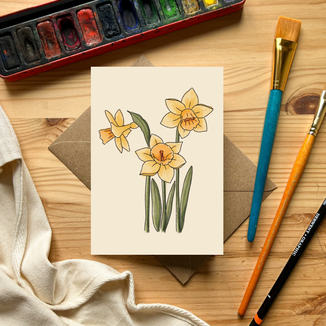 Photo of Daffodil Card by Emma Macdonald, the artist behind Pippin Prints, with three blooming daffodils and no message inside.